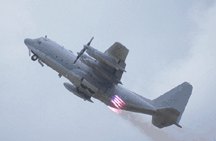 C-130 takes off using 8 JATO bottles